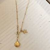 Dainty Sea Shell Zircon Pendant